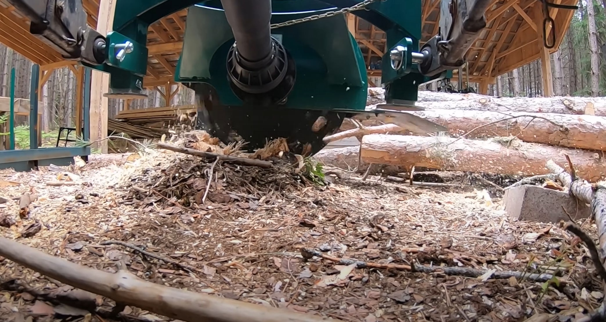 Professional stump grinding equipment removing tree stump in Woonsocket, RI