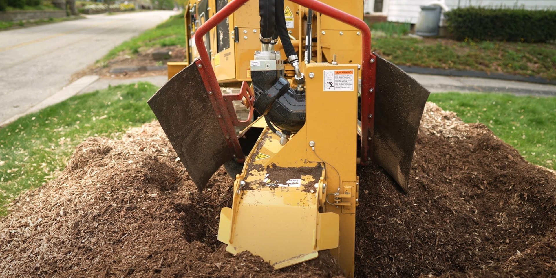 Stump grinding and removal services in Woonsocket Professional stump grinding equipment in action